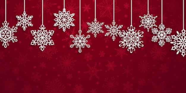 Christmas background with hanging paper snowflakes with soft shadows on red background