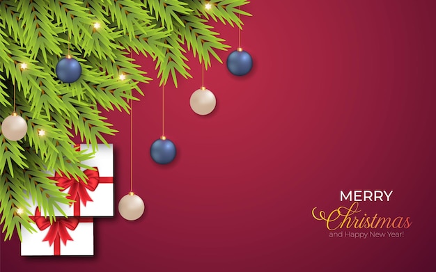 松の枝とクリスマスの背景クリスマスボールギフトボックス赤いリボンと星の光