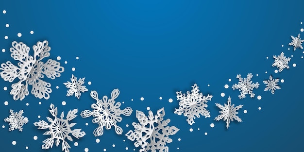 Christmas background with volume paper snowflakes with soft shadows on light blue background