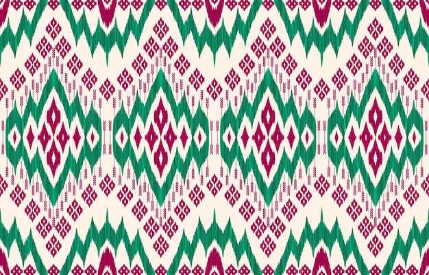 クリスマスカラーのイカット柄。幾何学的な部族のヴィンテージ レトロなスタイル。エスニック生地のシームレスなパターン。