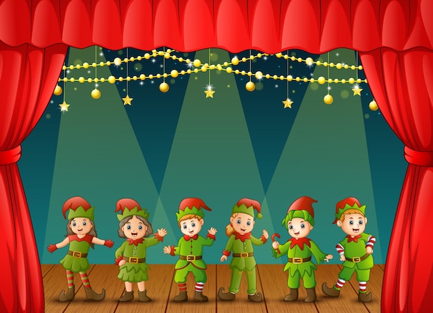 Vettore elfi di natale esibirsi sul palco