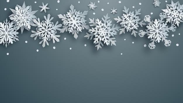 Christmas illustration of white complex paper snowflakes with soft shadows on gray background