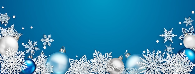 Christmas illustration with beautiful complex white paper snowflakes and colored balls on blue background