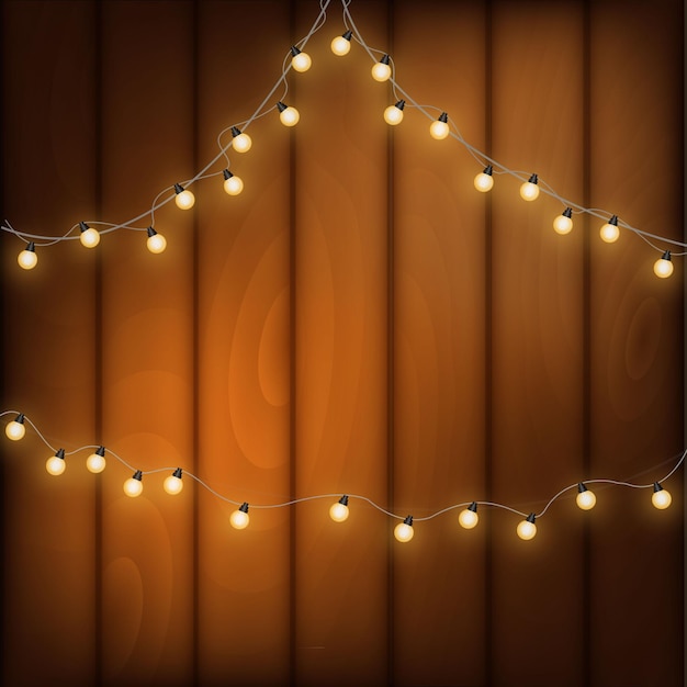 Christmas light on wooden background holiday decorations with color