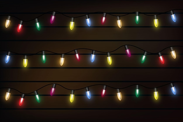 Christmas light on wooden background holiday decorations with color