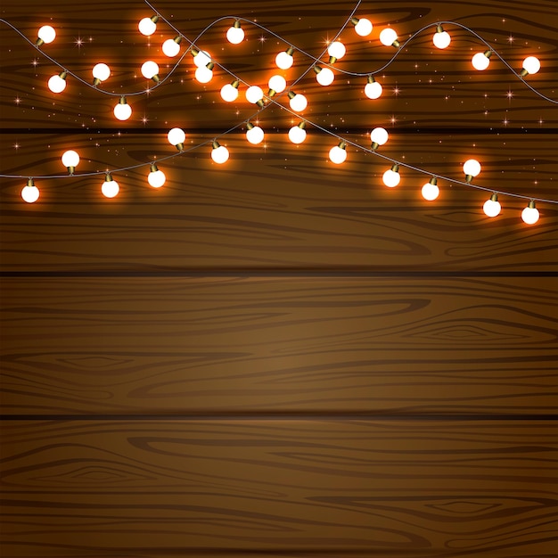 Vector christmas light on wooden background