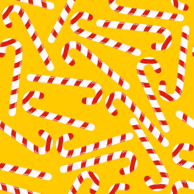 Christmas pattern with colorful striped candy in the form of a cane on a yellow background.