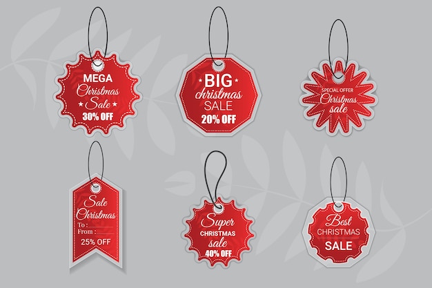 Vector christmas sale paper tags set with different shapes and hand drawn elements in red color