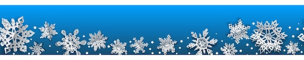 Vector christmas seamless banner with volume paper snowflakes with soft shadows on light blue background with horizontal repetition