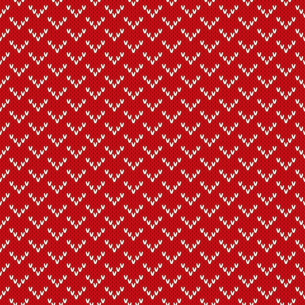 クリスマスのシームレスな編み物の背景。赤いニットパターン