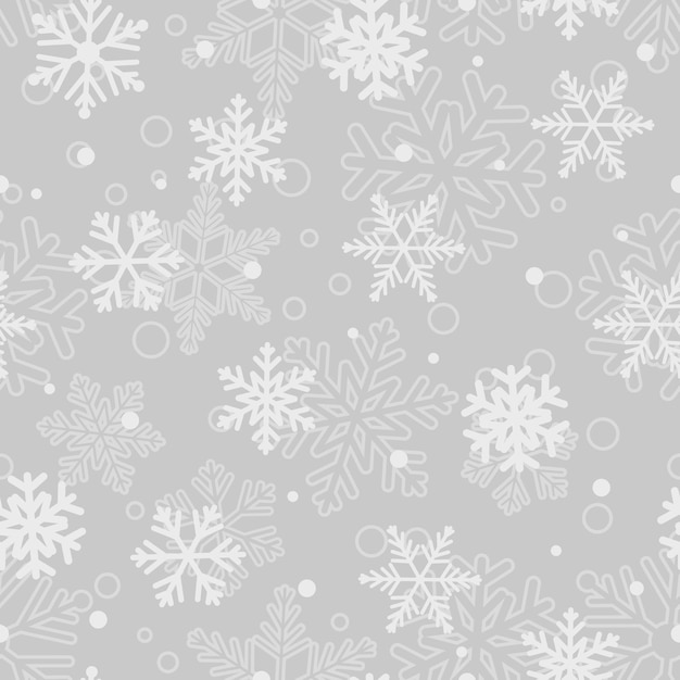 Christmas seamless pattern of big and small snowflakes, white on gray