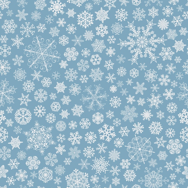 大小の雪片のクリスマスのシームレスなパターン、水色に白