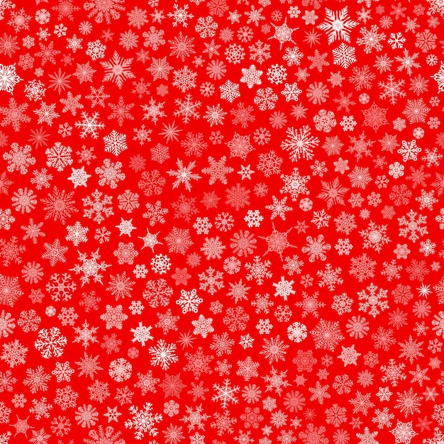 Christmas seamless pattern of small snowflakes white on red