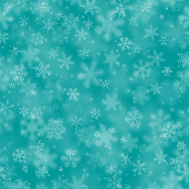 Christmas seamless pattern of snowflakes of different shapes sizes blur and transparency on light blue background