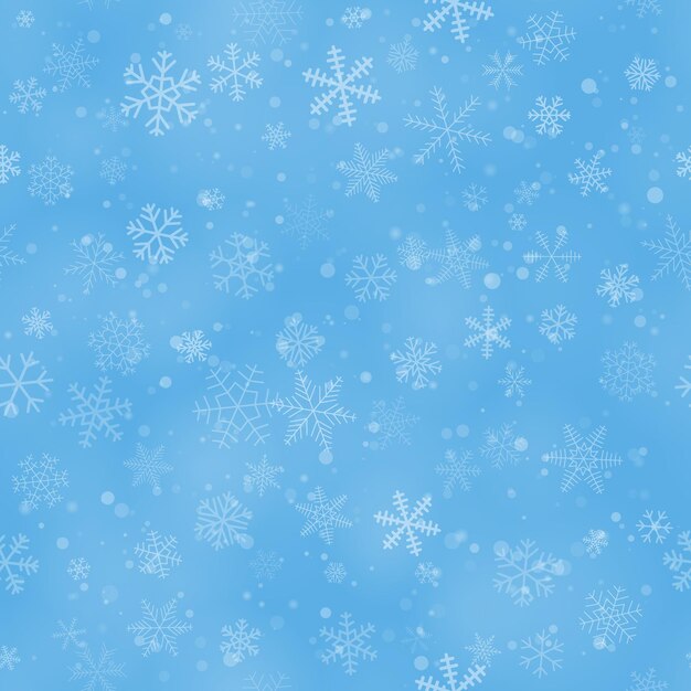 Christmas seamless pattern of snowflakes of different shapes sizes and transparency on light blue background