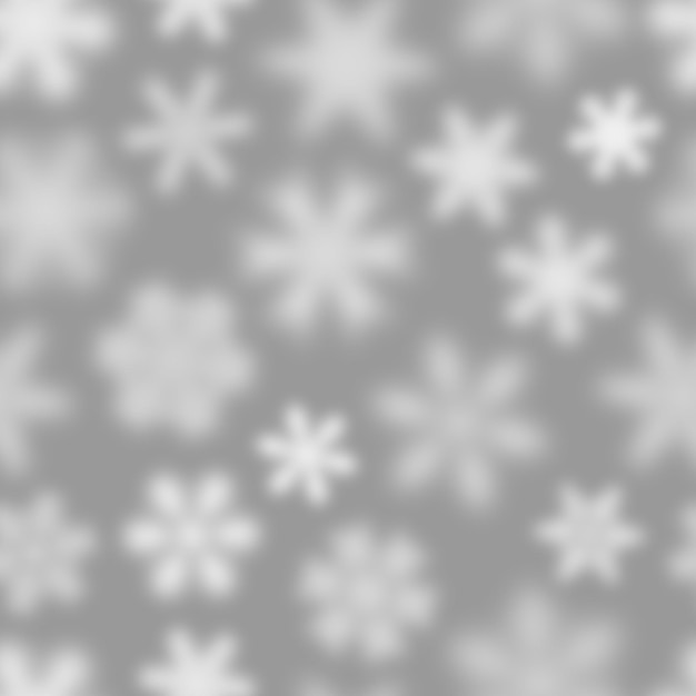 灰色の背景に白いデフォーカス雪片のクリスマスのシームレスなパターン