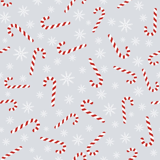 Vector christmas seamless pattern with candy canes and snowflakes. background for wrapping paper