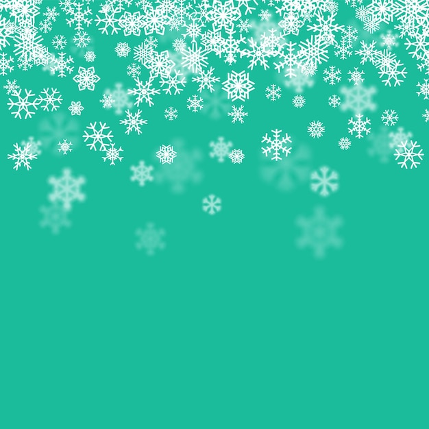 Christmas snow seasonal background with scattered snowflakes falling in winter time for new years holidays