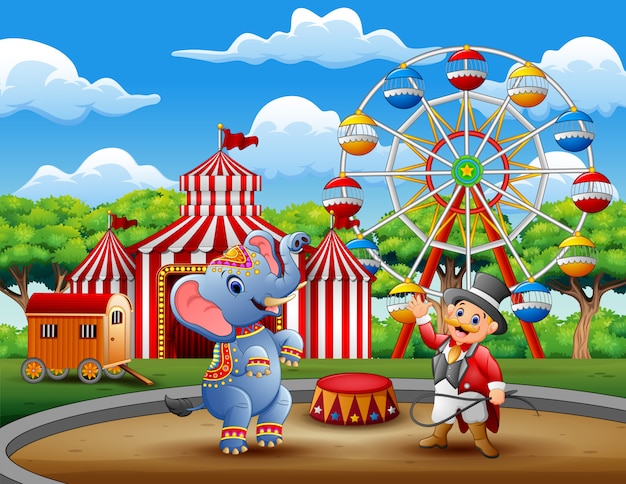 Circus ringmaster performs a trick along with elephant