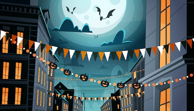 Vector city decorated for halloween celebration, with pumpkins, garlands night party concept