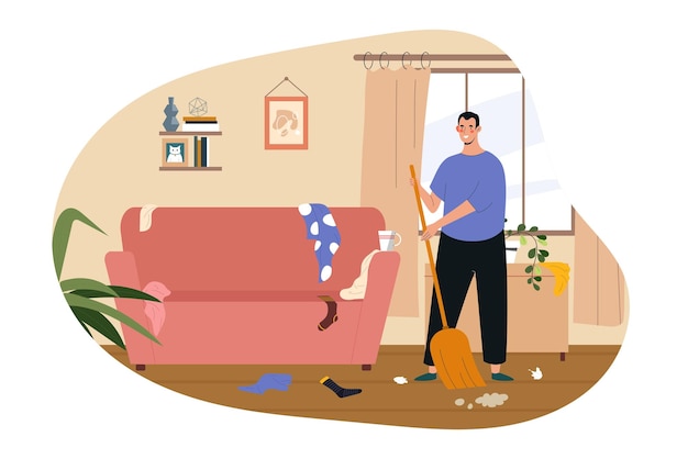 Cleaning floor at home concept man with broom in chaos indoor young guy with dust in apartment