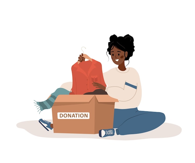 Vector clothes donation african woman putting old used clothes ready to be shared or recycled to cardboard box volunteering and social care concept international charity day vector cartoon illustration