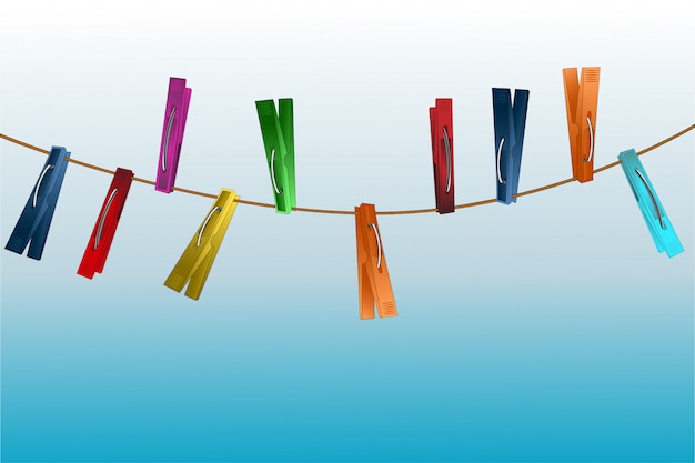 Vector clothespins on a rope on a light blue gradient