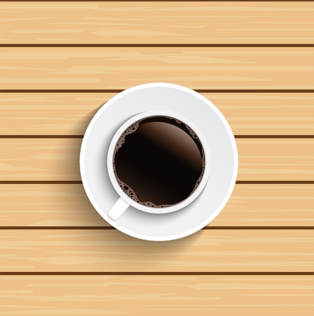 Coffee cup on wooden table top view