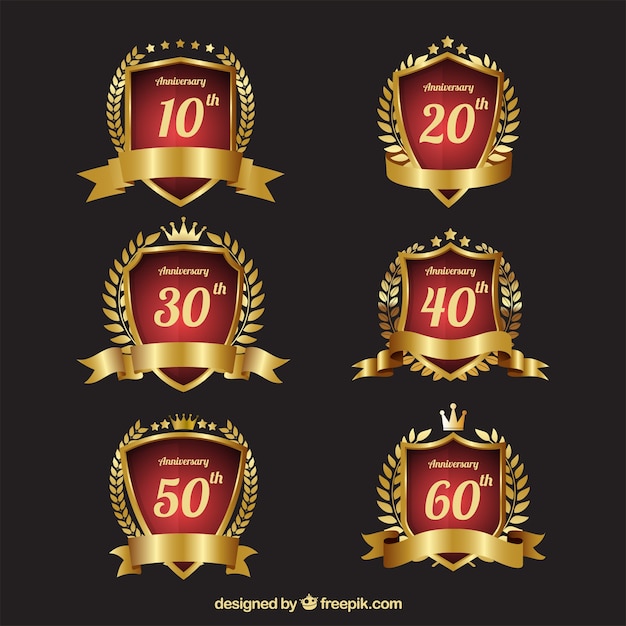 Vector collection of elegant golden anniversary crests