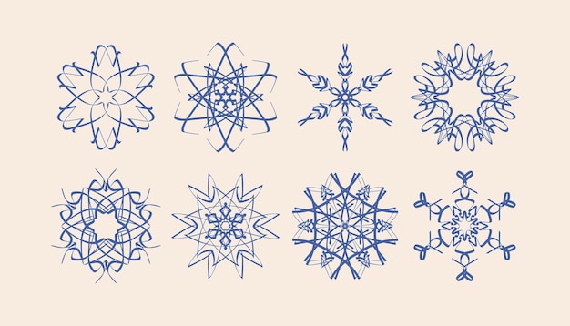 Коллекция изящных синих снежинок на розовом фоне. элементы для дизайна.