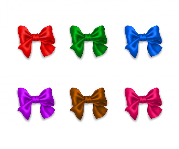 Collection of realistic decorative multicolored shiny ribbon bows.