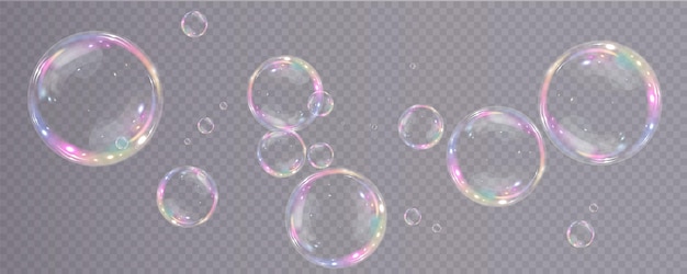 Collection of realistic soap bubbles. Bubbles are located on a transparent background.