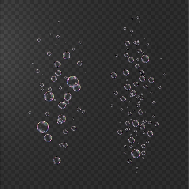 Коллекция реалистичных мыльных пузырей, пузыри расположены на прозрачном фоне.