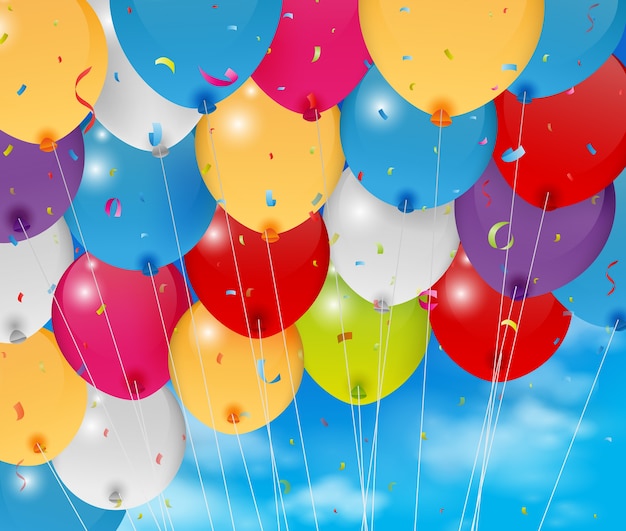 Colorful birthday balloon on blue sky