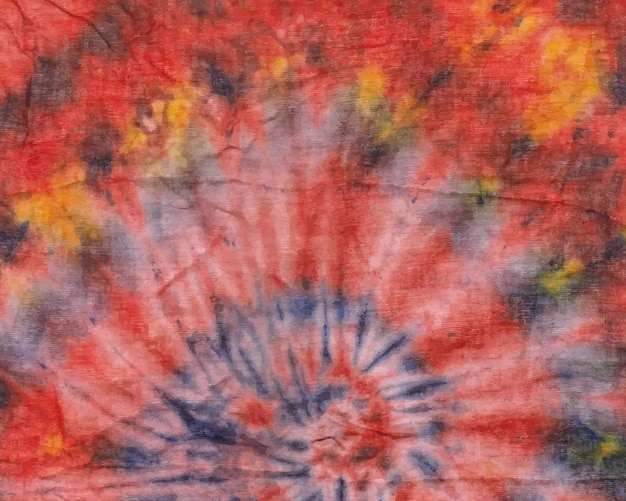 Colorful hand painted watercolor orange spiral tie-dye pattern background