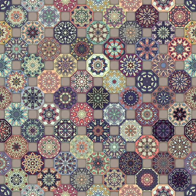 Colorful vintage seamless pattern with floral and mandala elements.Hand drawn background.