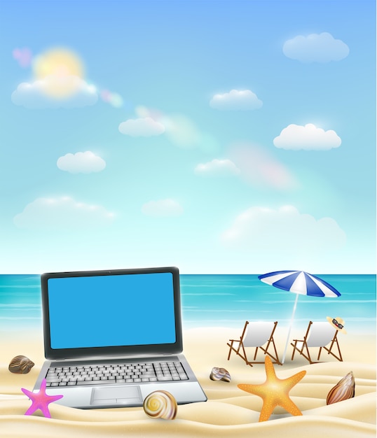 Computer laptop on a sand beach