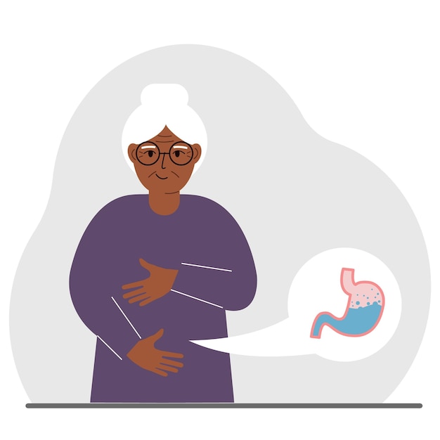 Il concetto di uno stomaco sano la vecchia donna tiene il suo stomaco con entrambe le mani uno stomaco sano o una corretta digestione