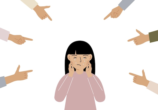 the concept of public condemnation victim blaming and bullying crying depressed girl the fingers point at the character and hate him internet cyberbullying
