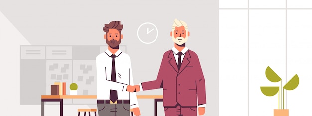 Vector couple businessmen handshaking business partners hand shake during meeting agreement partnership colleagues standing in co-working center modern office interior