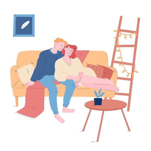 Couple hugging sitting on couch at home