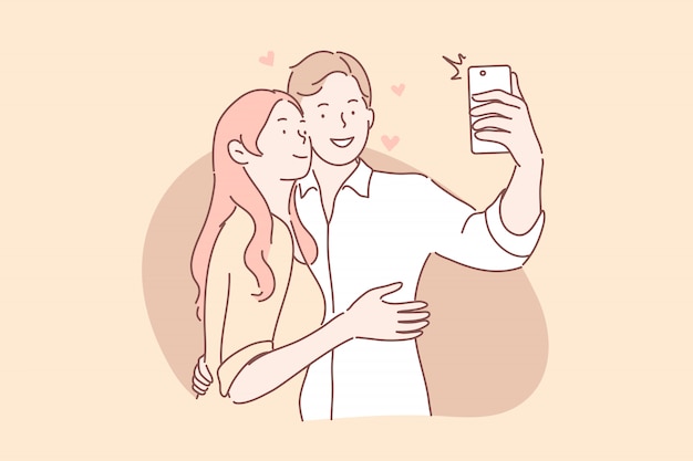 Le coppie nell'amore prendono il concetto del selfie