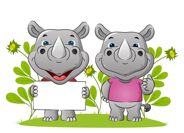 Vector the couple of rhino is holding the blank board and giving the thumb up   illustration