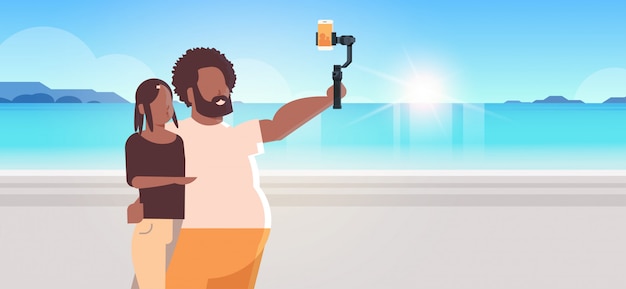 Vector couple standing together sea beach  man woman holding selfie stick taking photo on smartphone