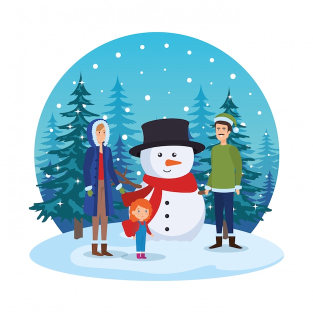 Couple with daughter and snowman in snowscape