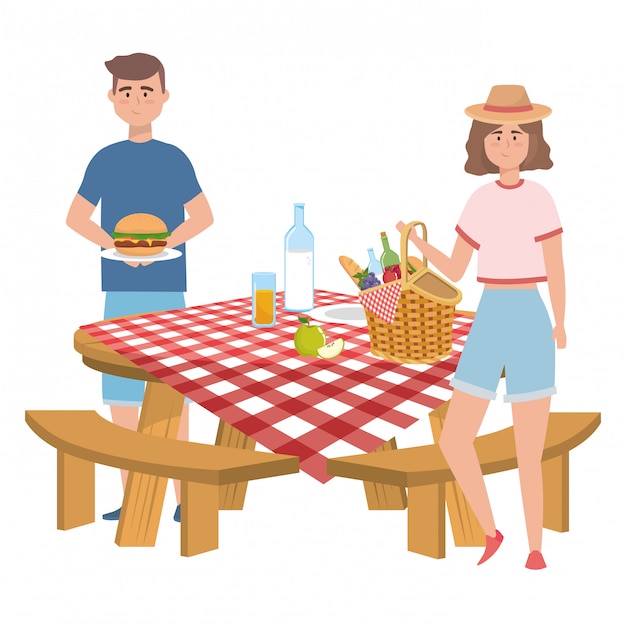 Couple of woman and man having picnic