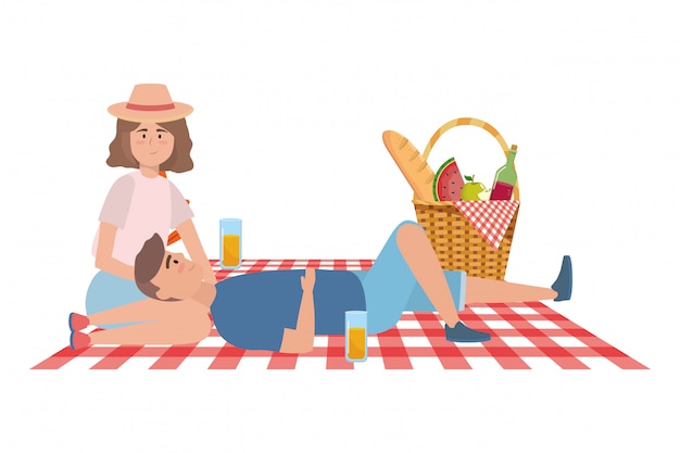 Couple of woman and man having picnic 