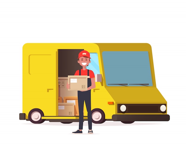 Courier with parcel on the background of a delivery service van