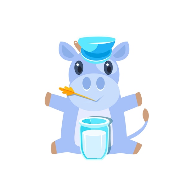 ミルクのガラスと座っている帽子の牛