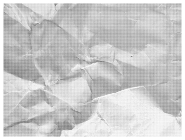 crumpled light paper texture with halftone effect